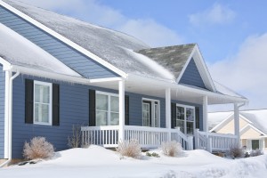 A house covered by snow to be sold in the winter